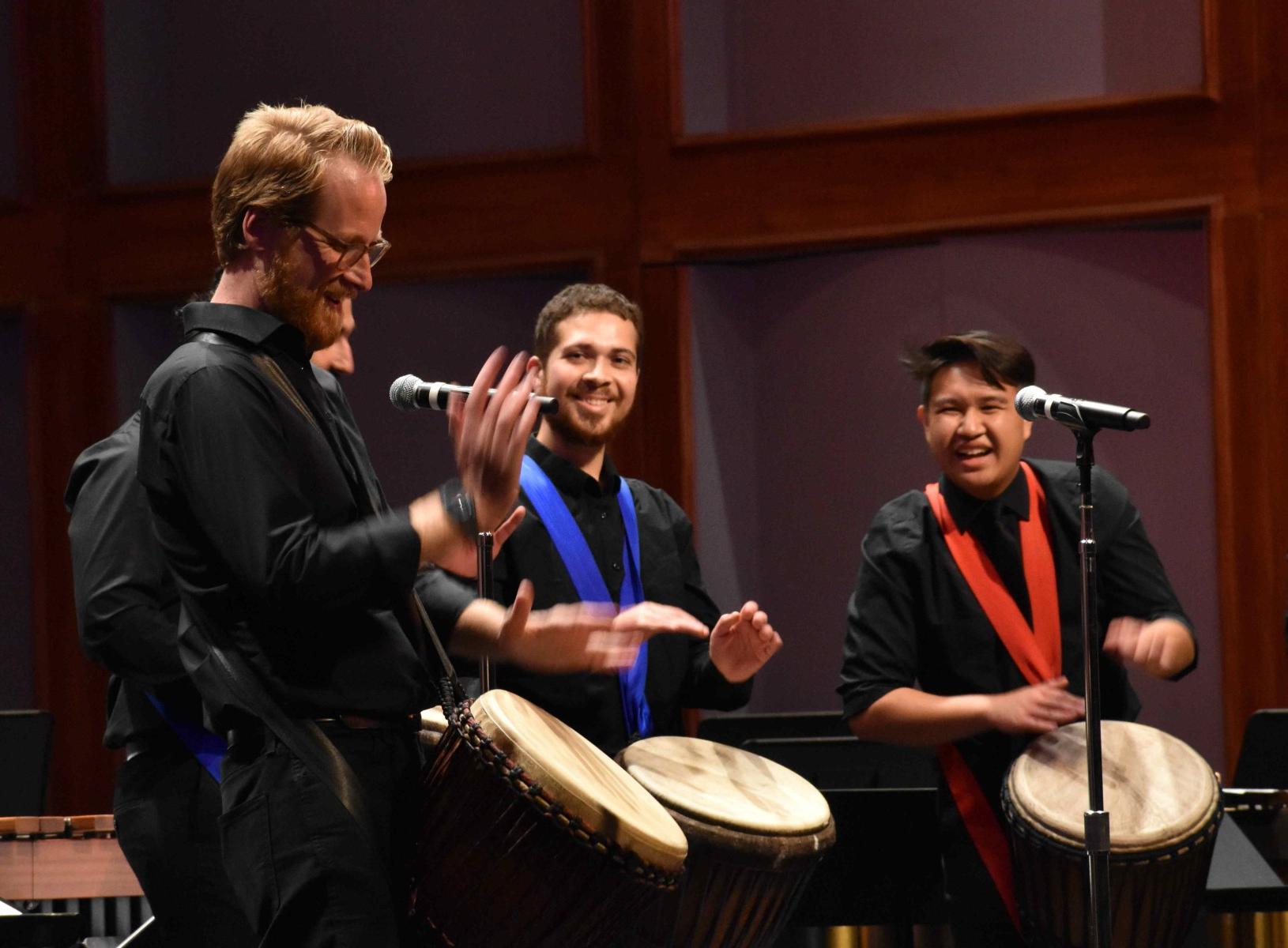 Dr. Adam Snow leading the Percussion Ensemble